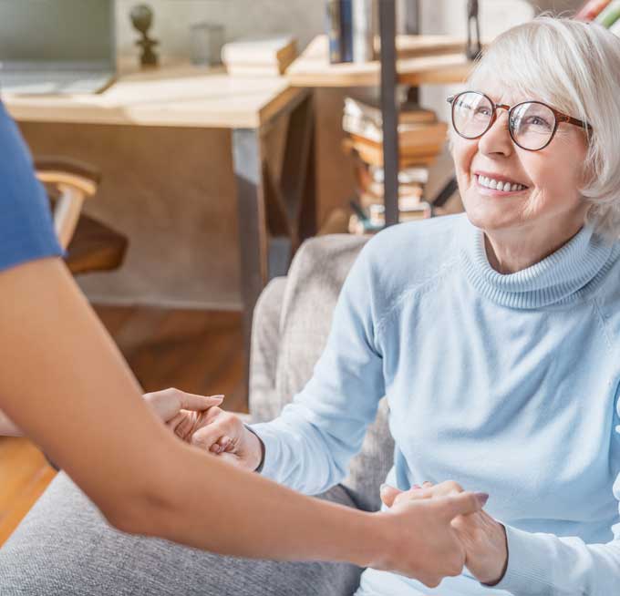 staff helping senior up