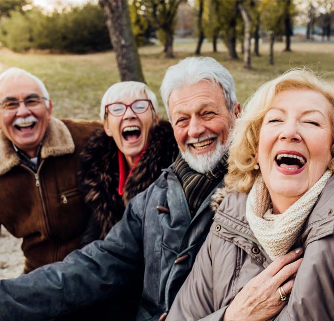 seniors outside laughing