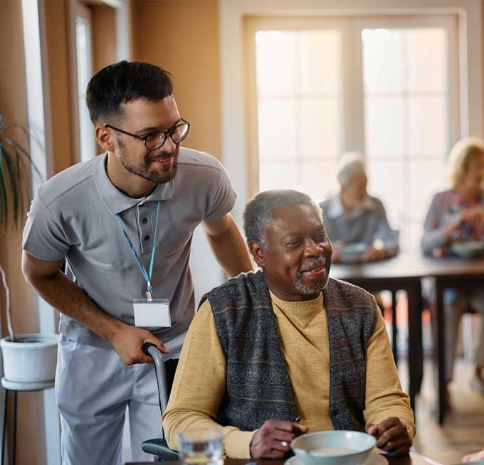 staff-member-caring-for-senior staff member caring for senior