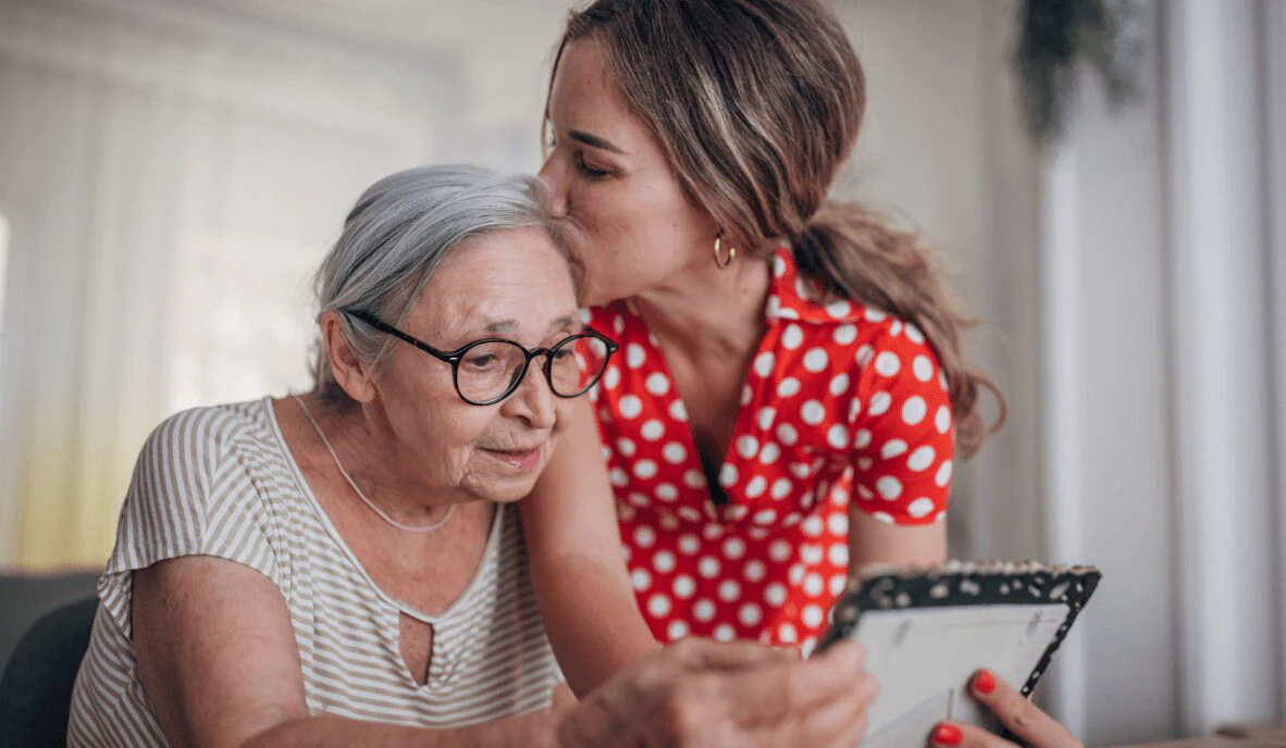 Senior woman on device